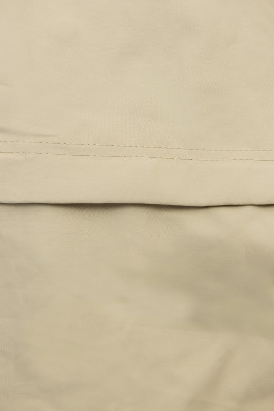 Béžová jarní parka s velkou kapucí