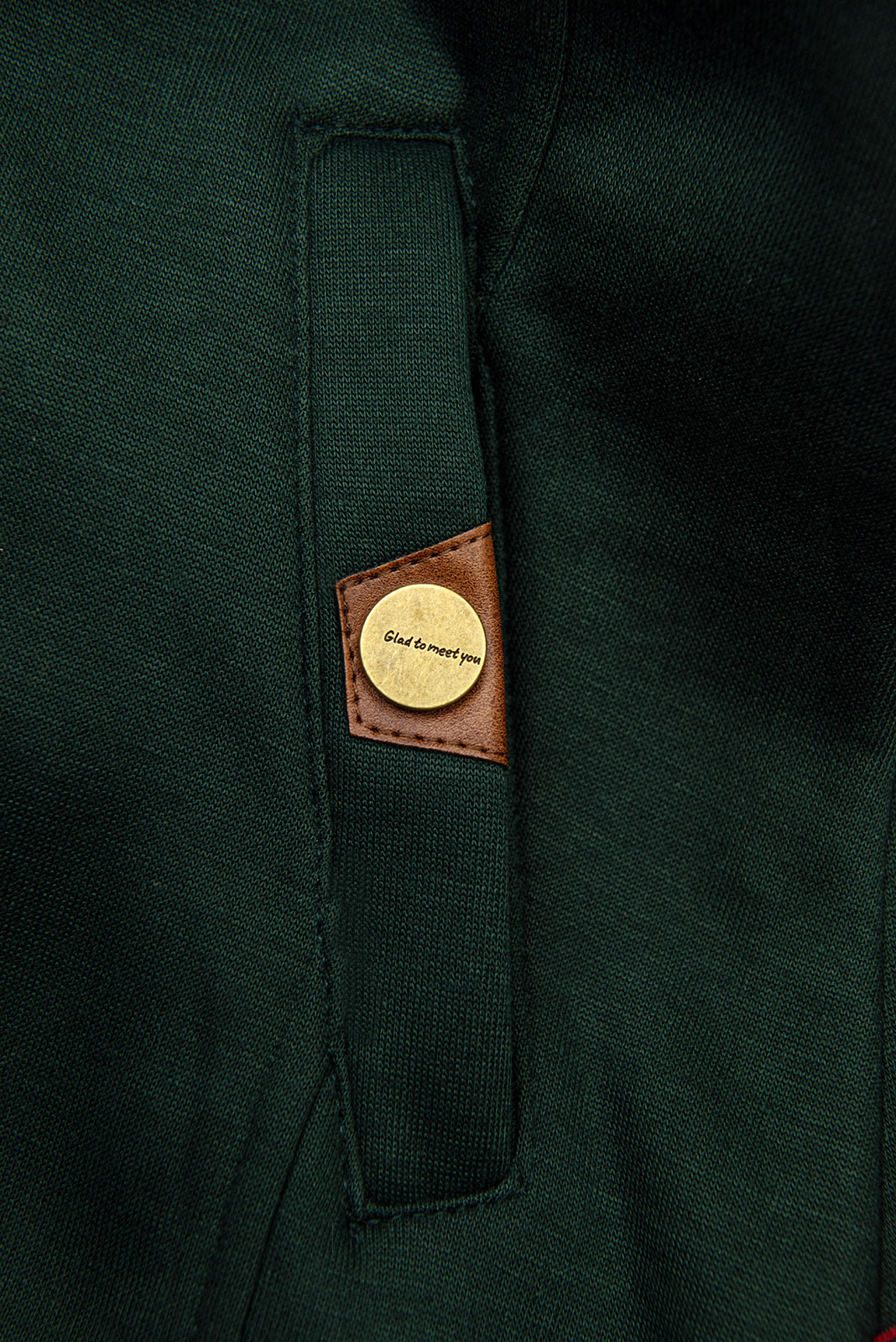 Smaragdově zelená mikina s prošívanou kapucí