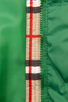 Zelená přechodná bunda s károvaným lemem